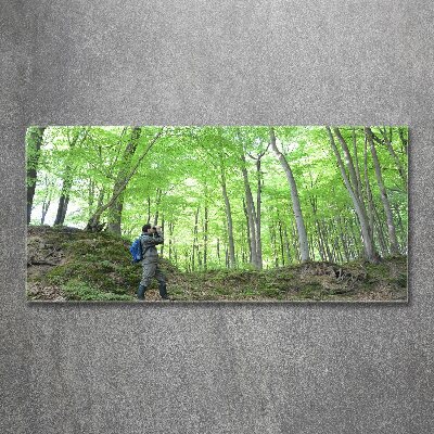 Foto obraz szkło akryl Ornitolog w lesie