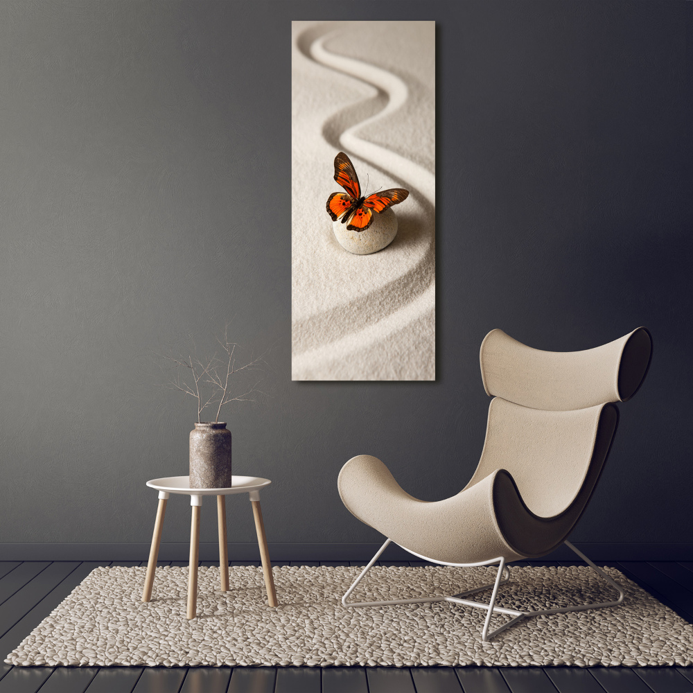 Foto obraz akryl pionowy Kamień zen i motyl