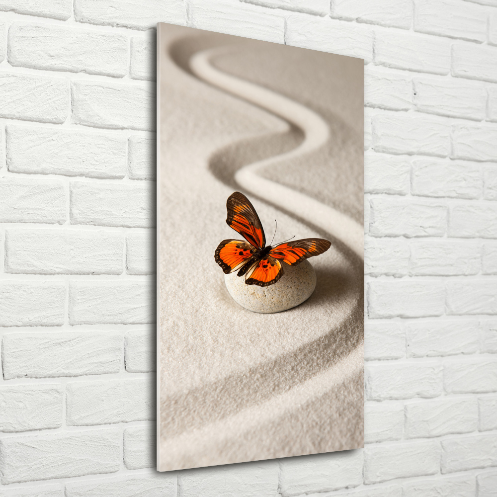 Foto obraz akryl pionowy Kamień zen i motyl