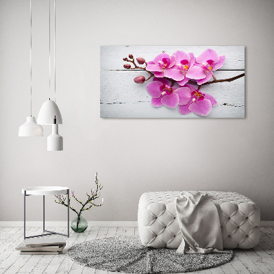 Foto obraz na płótnie Orchidea na drewnie