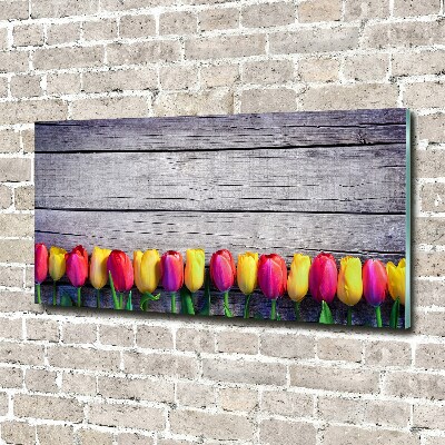 Foto obraz szklany Tulipany na drewnie