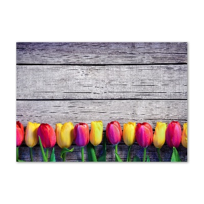 Foto obraz szklany Tulipany na drewnie