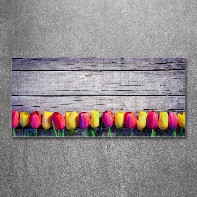 Foto obraz szklany Tulipany na drewnie