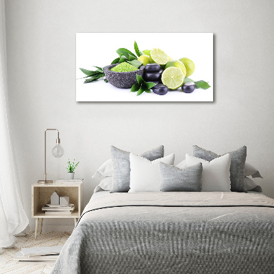 Foto obraz szklany Limonki i kamienie